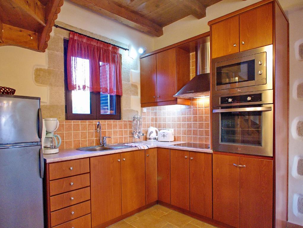 Kuchyňa alebo kuchynka v ubytovaní Villa Zara