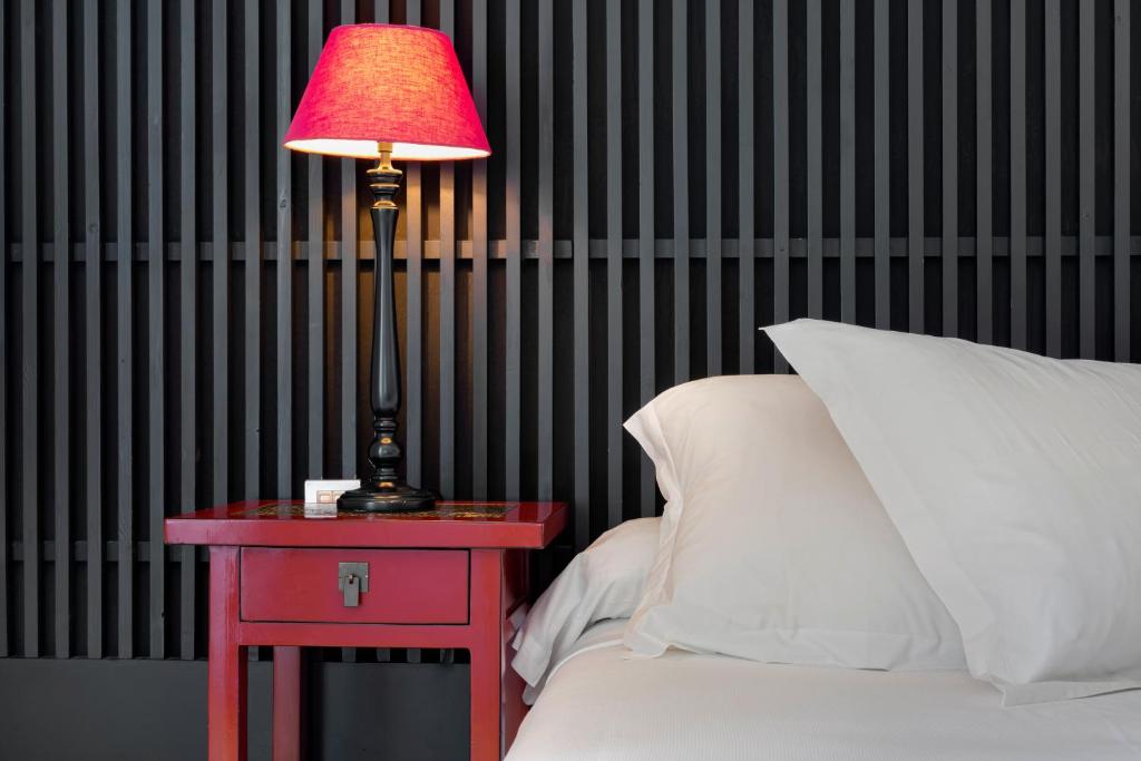 A bed or beds in a room at Hotel Market