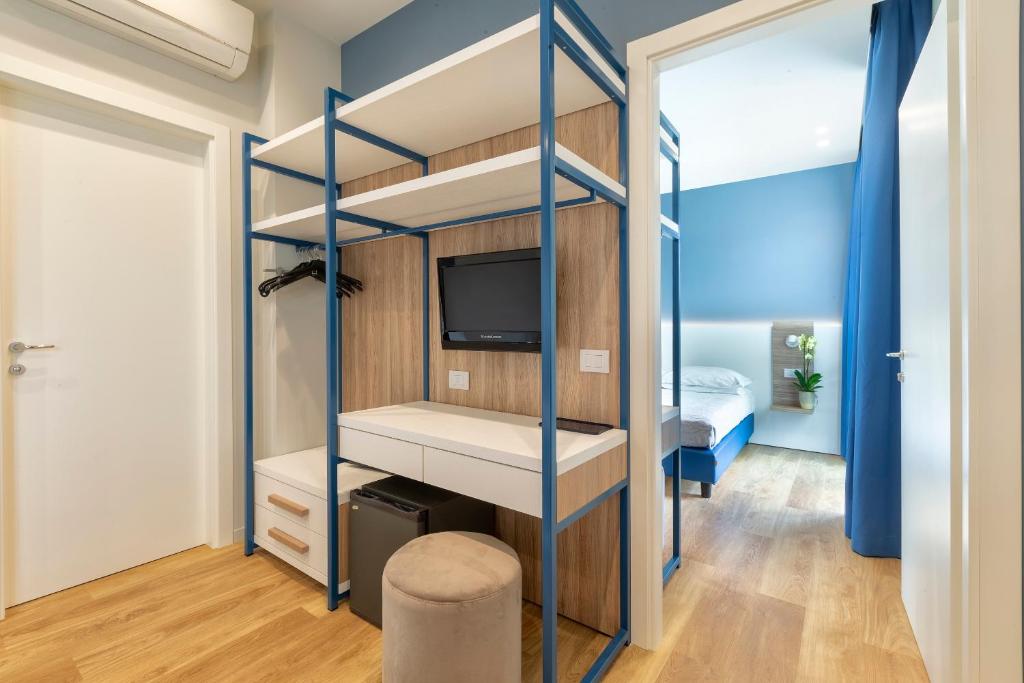 Postel nebo postele na pokoji v ubytování Hotel Gemma