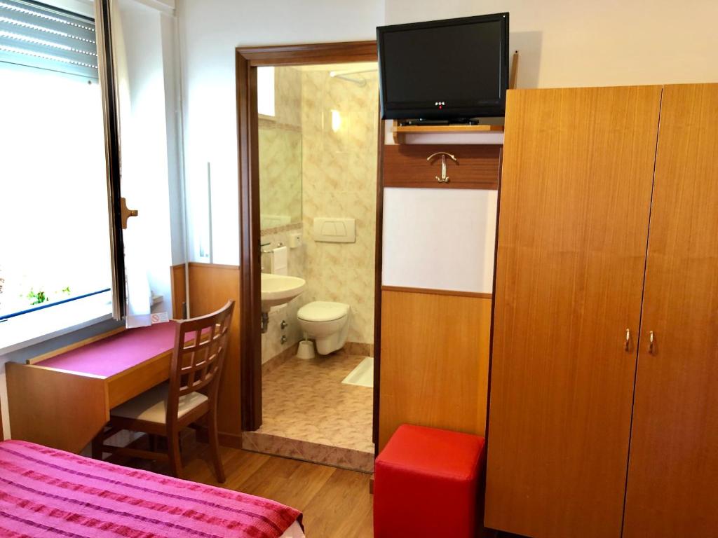 Postel nebo postele na pokoji v ubytování Hotel Signa