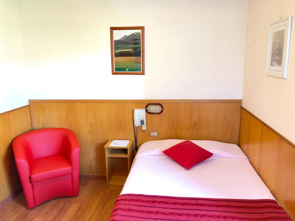 Postel nebo postele na pokoji v ubytování Hotel Signa