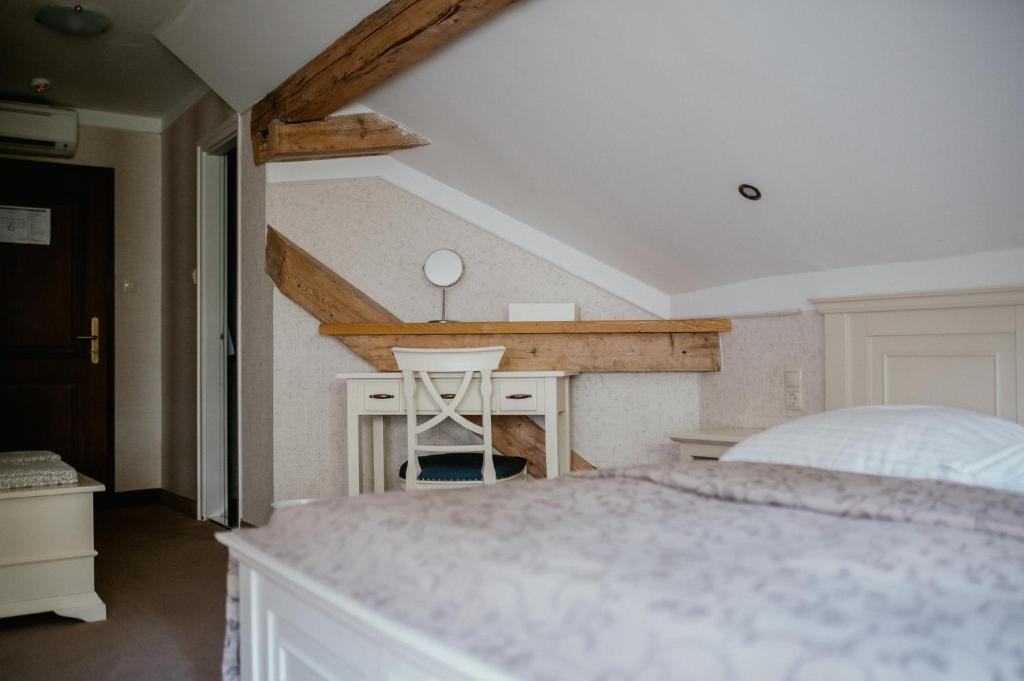 Postel nebo postele na pokoji v ubytování Boutique Hotel Annuska