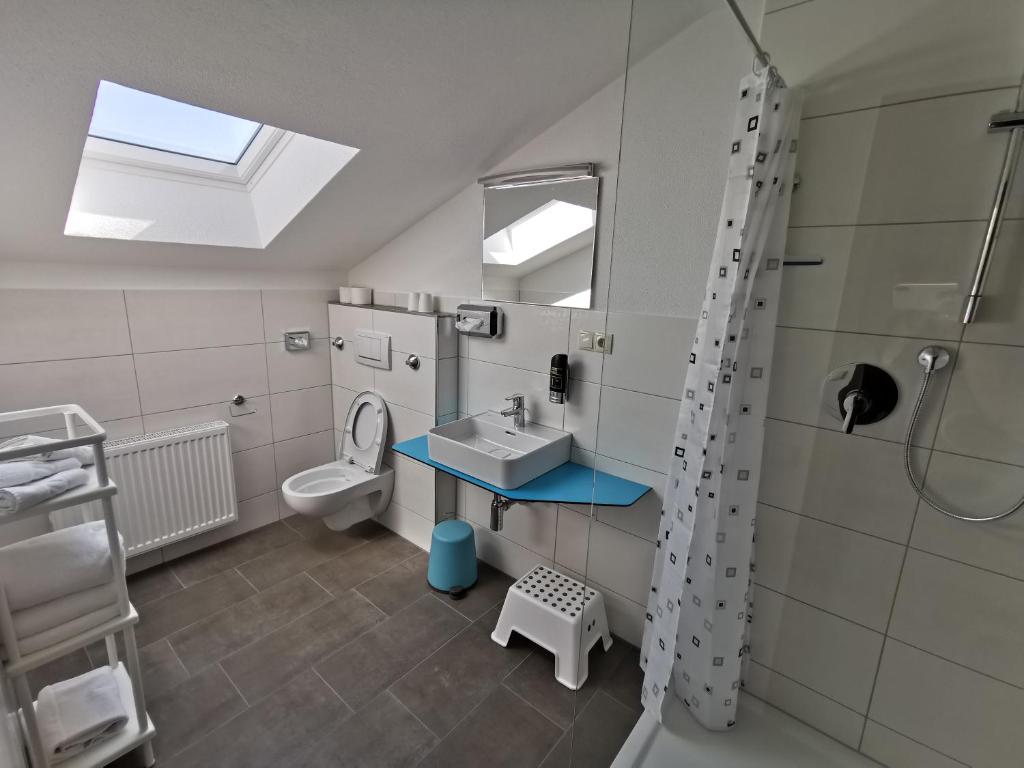 Koupelna v ubytování Hotel Allgäu Garni