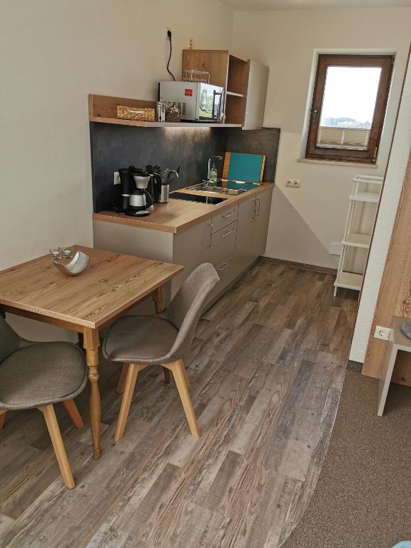 Kuchyň nebo kuchyňský kout v ubytování Hotel Allgäu Garni