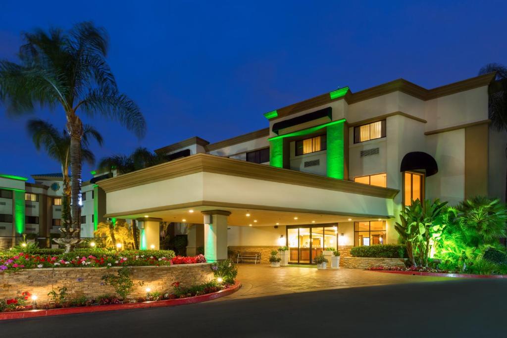 a rendering of a hotel at night at Holiday Inn Santa Ana-Orange County Airport, an IHG Hotel in Santa Ana