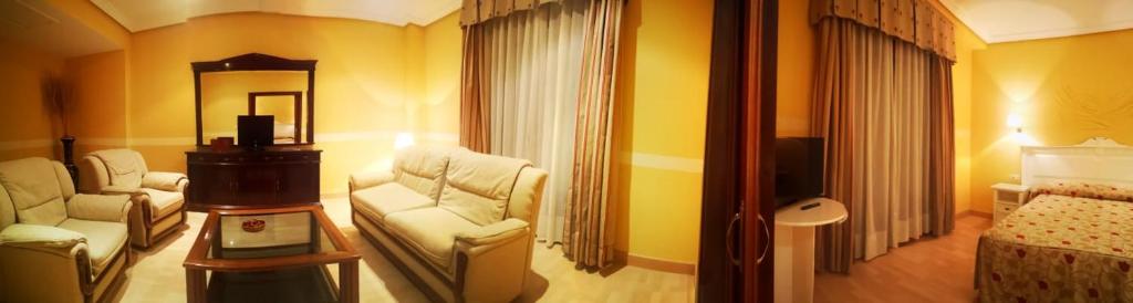 Posteľ alebo postele v izbe v ubytovaní Hotel Acosta Vetonia