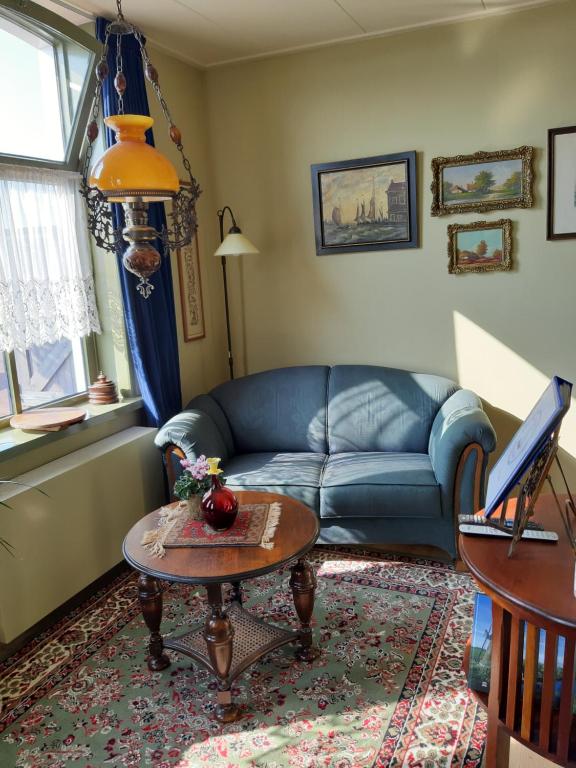 De Kapiteinshut aan de rivier met XL ligbad en sauna - One-Bedroom Apartment