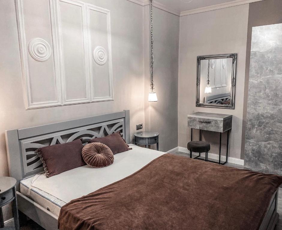 Letto o letti in una camera di Opera Center Hotel & Apartments