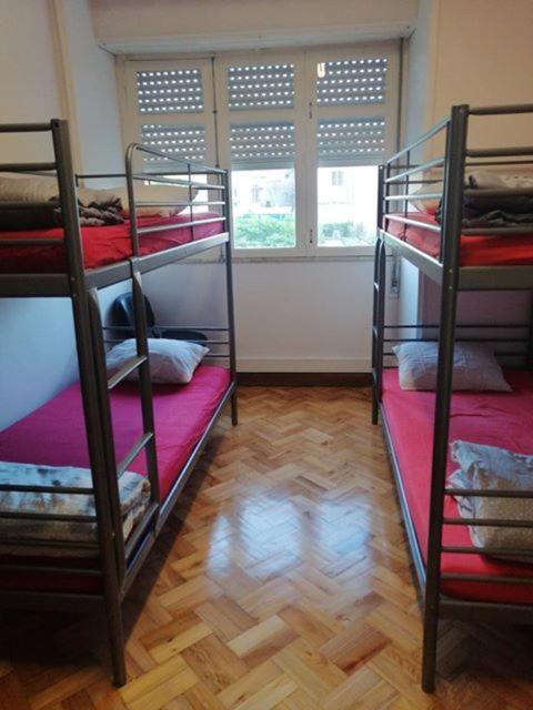 Postel nebo postele na pokoji v ubytování Sasimi Nice Hostel