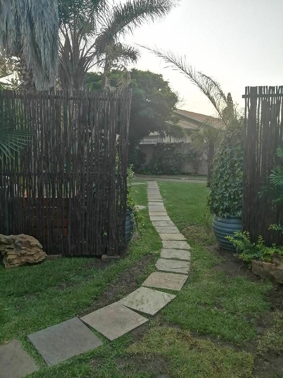 Giardino di Roxy's Rest Guest House