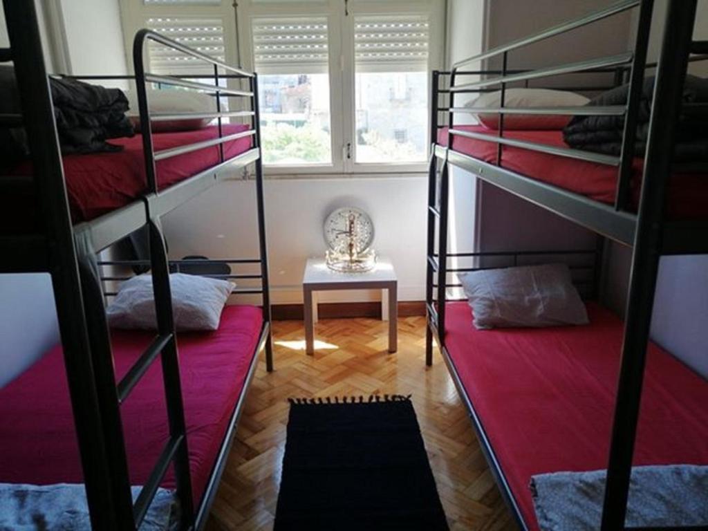 Postel nebo postele na pokoji v ubytování Sasimi Nice Hostel