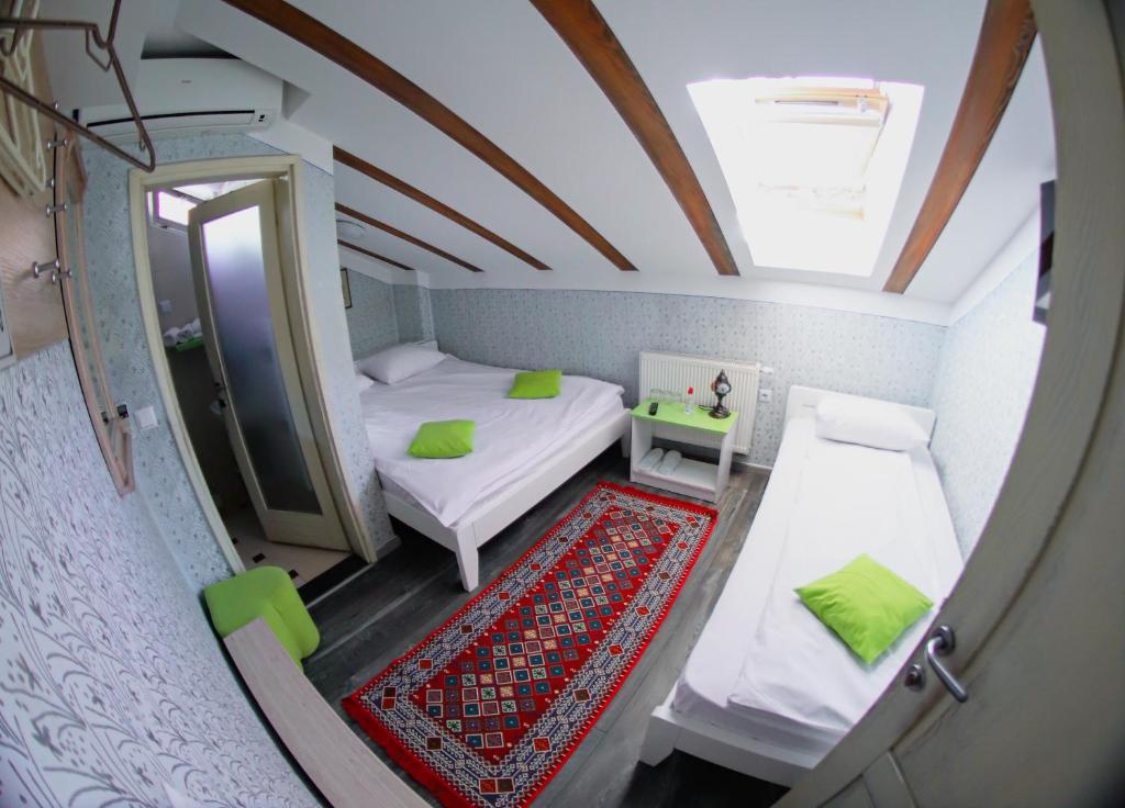 Postel nebo postele na pokoji v ubytování Hotel Lula