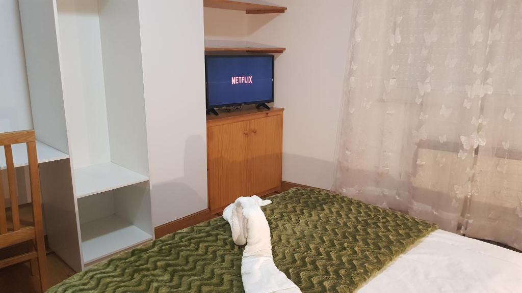 Posteľ alebo postele v izbe v ubytovaní Apartamentos Shalom Ribadeo