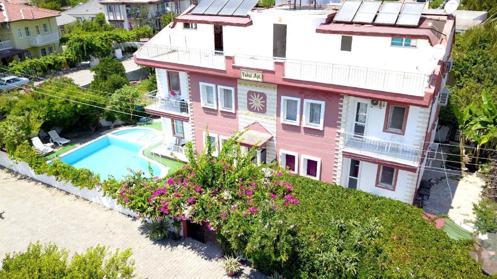 an aerial view of a house with a swimming pool at Yakut Apart Hotel in Dalyan