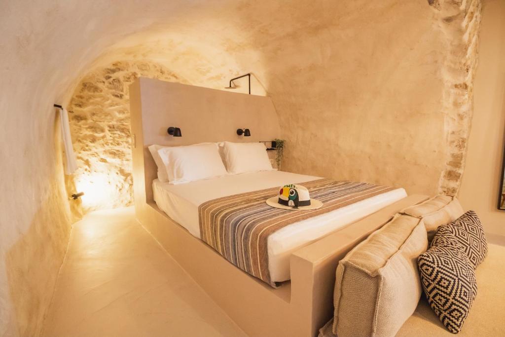 Postel nebo postele na pokoji v ubytování Pyli Apartments