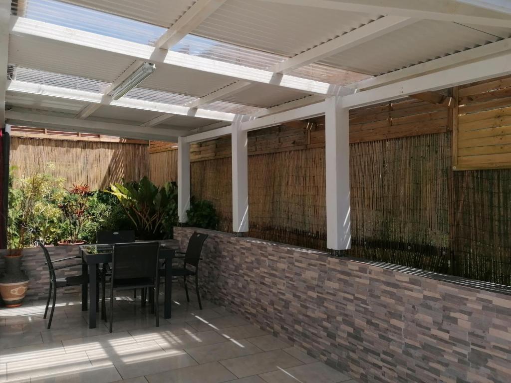 Patio nebo venkovní prostory v ubytování Résidence B&L Lagon : T3 Alizés
