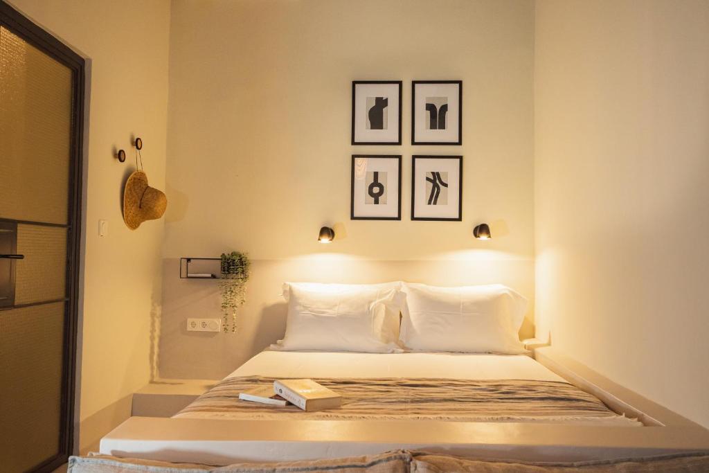 Postel nebo postele na pokoji v ubytování Pyli Apartments