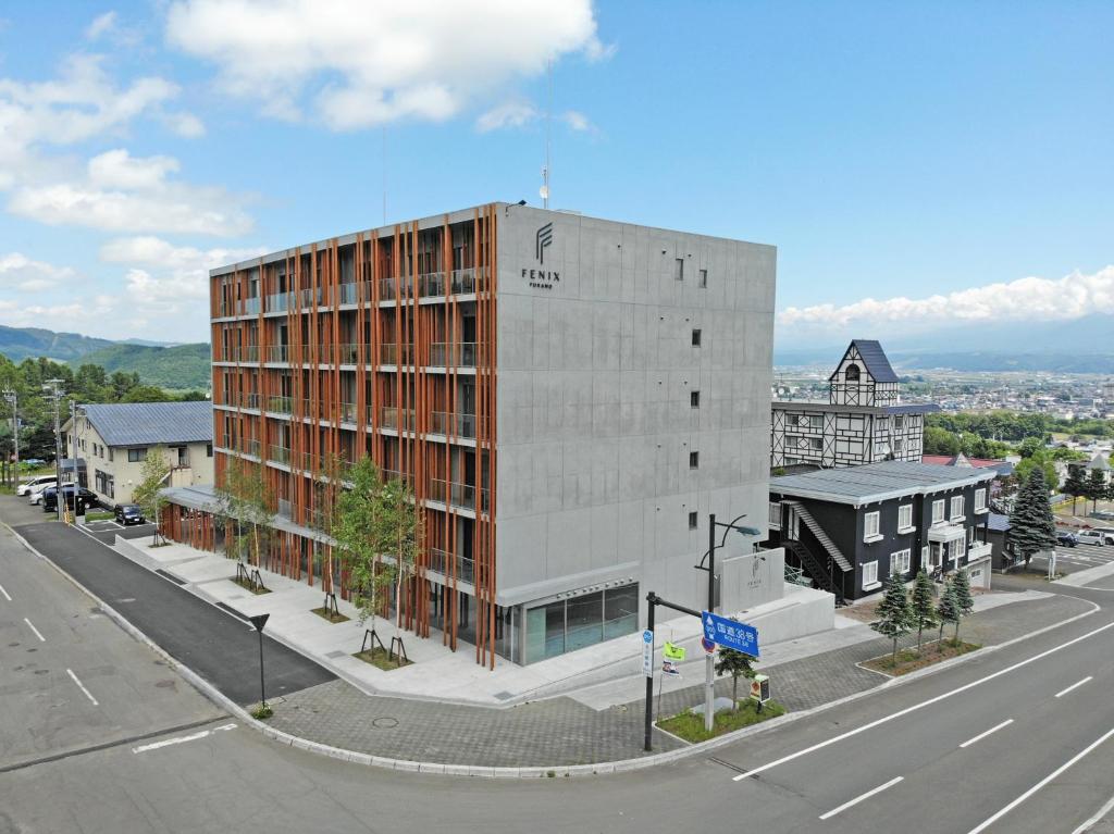 an overhead view of a building on a city street at Fenix Furano in Furano