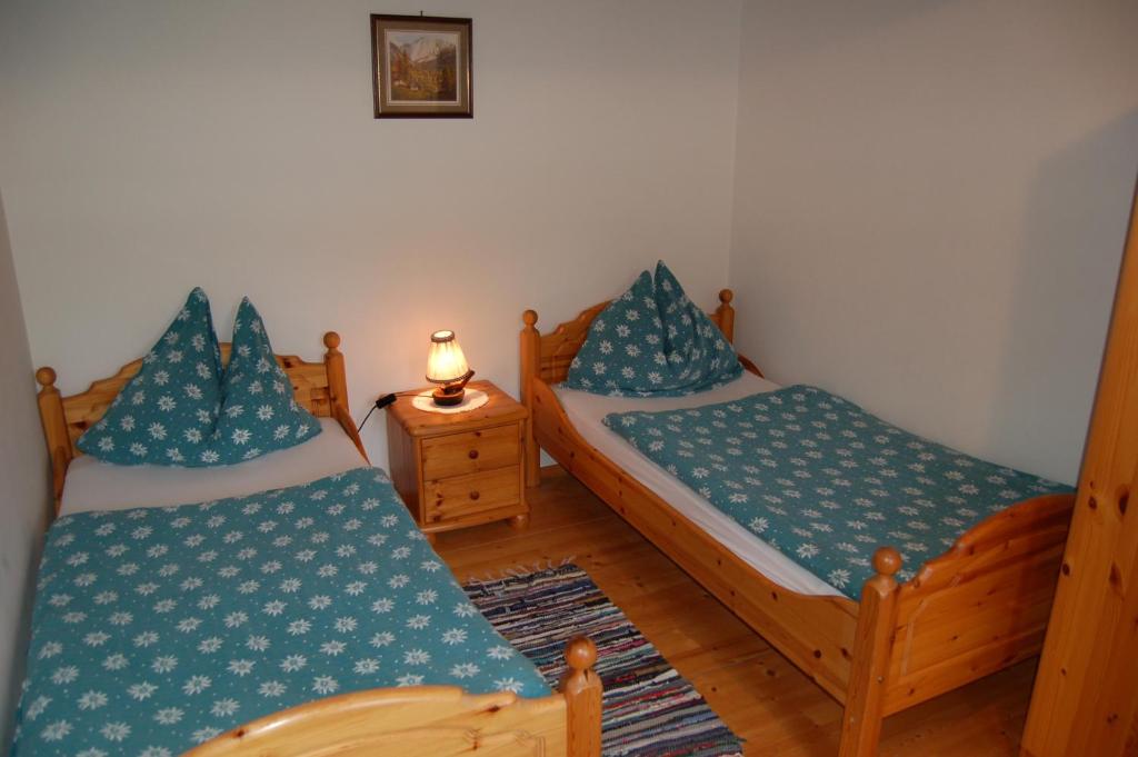 Postel nebo postele na pokoji v ubytování Haus Moser