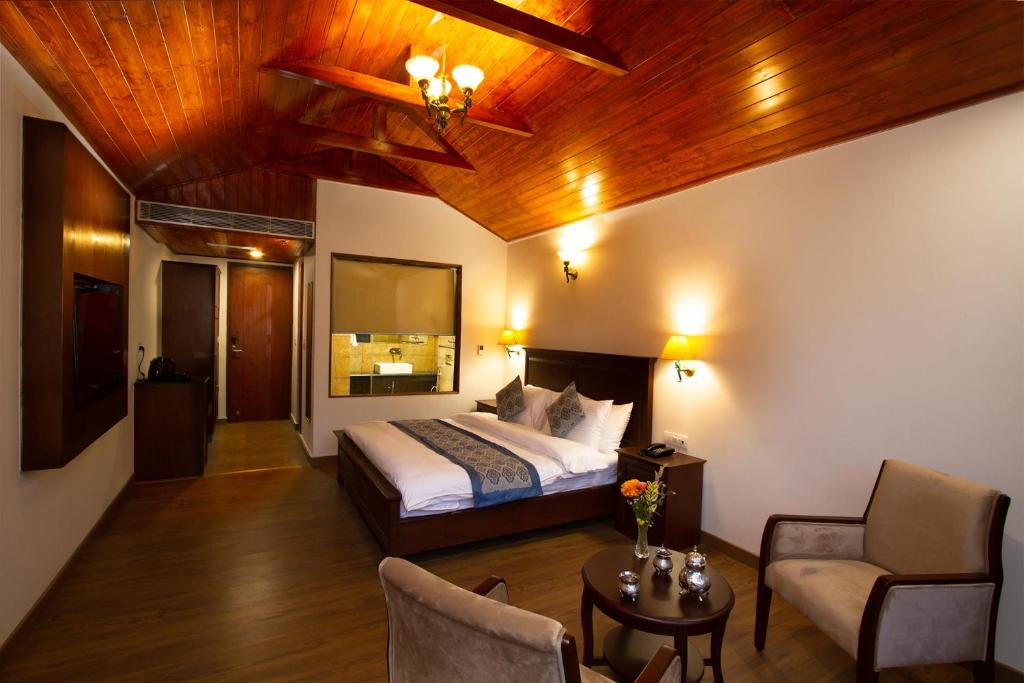 Postel nebo postele na pokoji v ubytování Aloka Resort