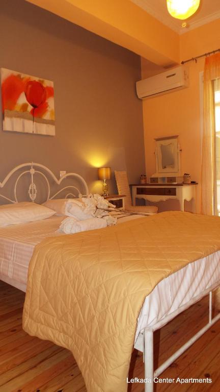 Posteľ alebo postele v izbe v ubytovaní Lefkada Center Apartments