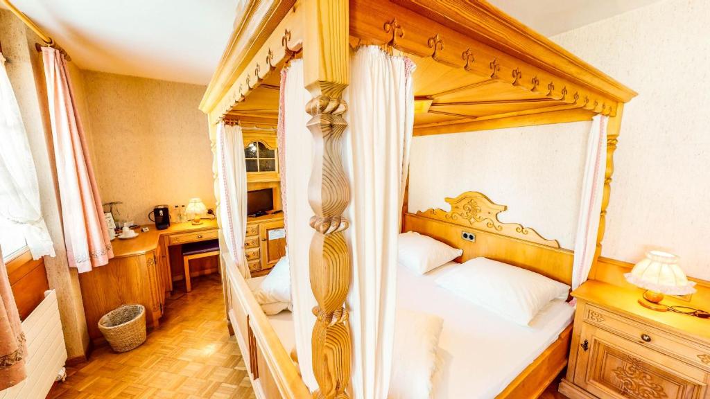Postel nebo postele na pokoji v ubytování Schweizerhof