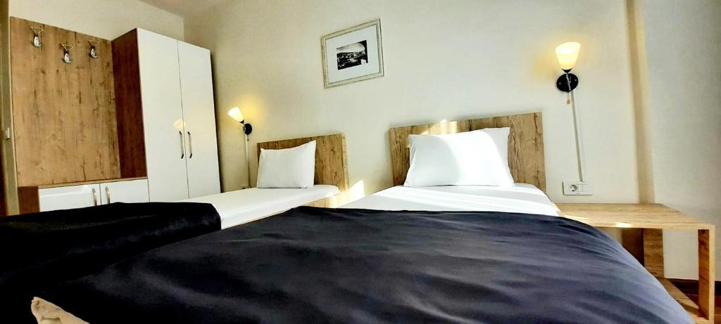 Postel nebo postele na pokoji v ubytování Hotel DOA