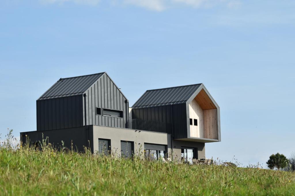 a house on top of a hill at Gîte Nuvole in Saint-Hilaire-Peyroux