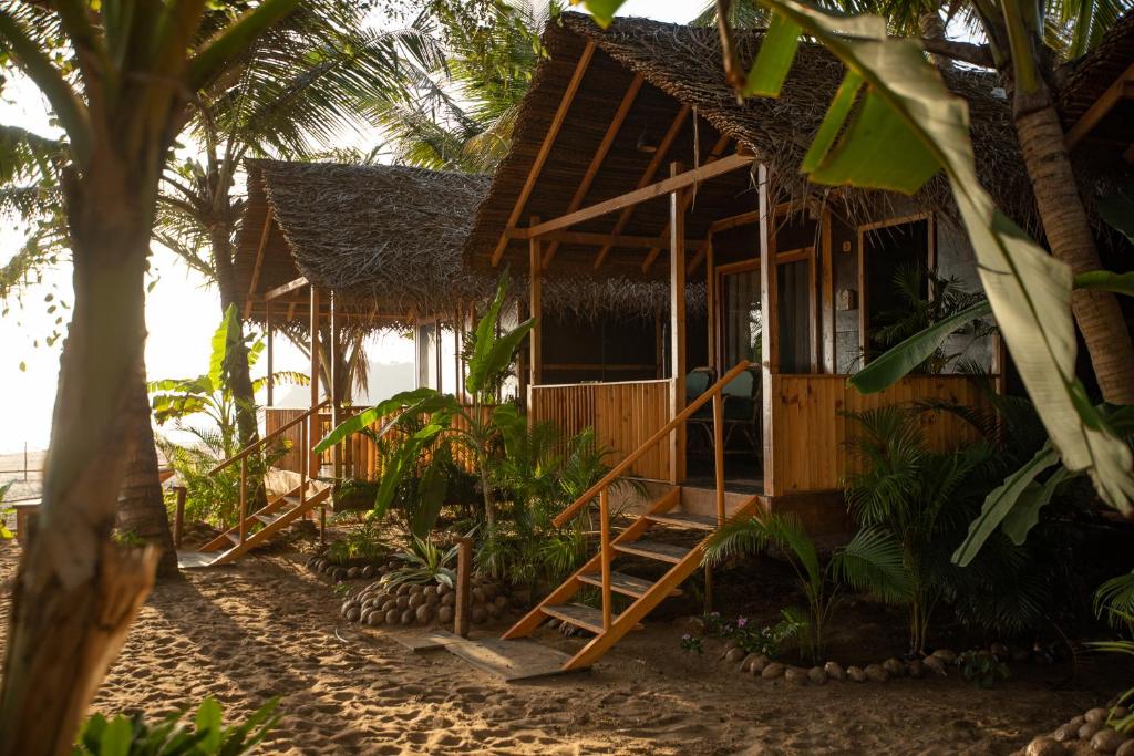 Сад в Goa Cottages Agonda