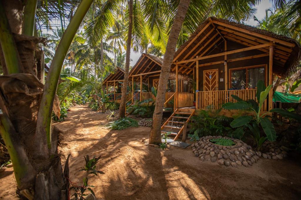 Сад в Goa Cottages Agonda