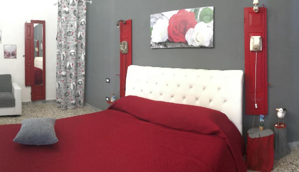 Postel nebo postele na pokoji v ubytování DON GIL Casa Vacanze