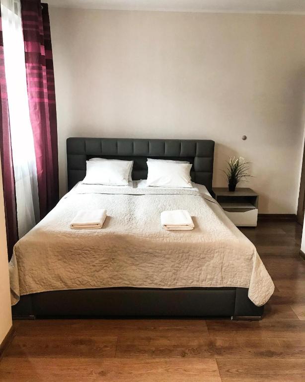 Posteľ alebo postele v izbe v ubytovaní Senator Warsaw Apartments