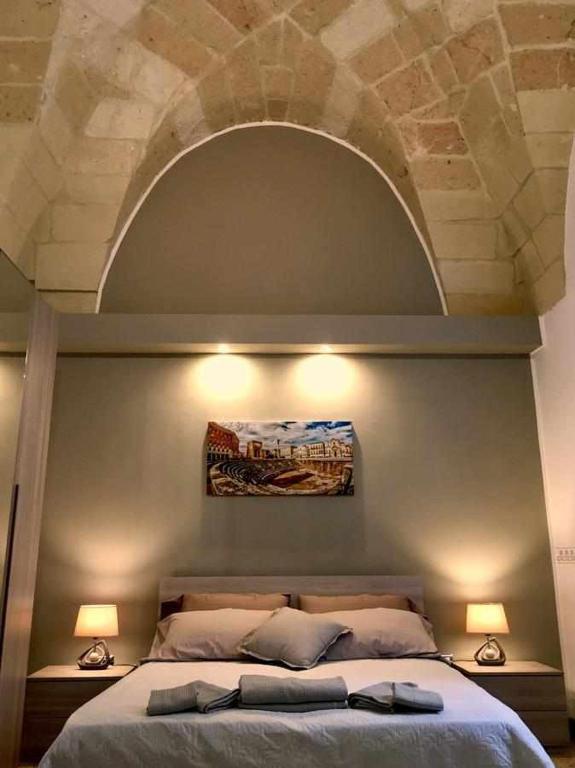 Postel nebo postele na pokoji v ubytování Wish Rooms Lecce