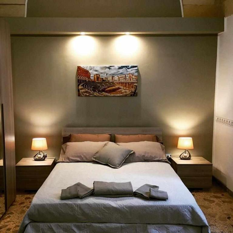 Postel nebo postele na pokoji v ubytování Wish Rooms Lecce