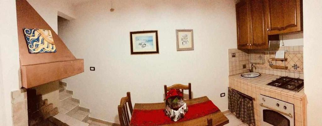 Kuchyň nebo kuchyňský kout v ubytování Wish Rooms Lecce