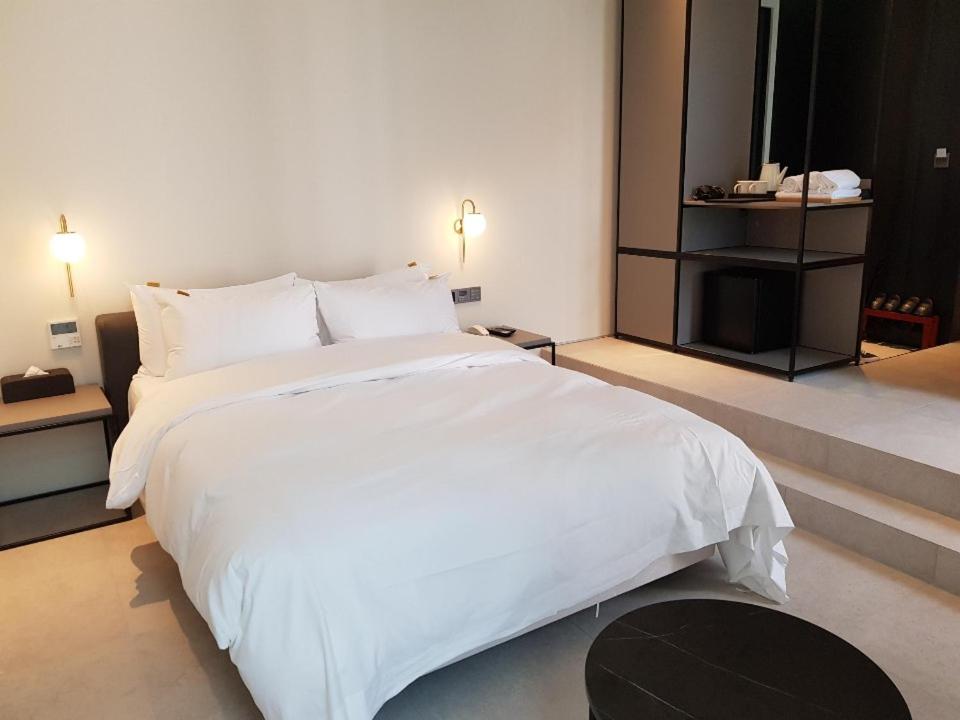 Postel nebo postele na pokoji v ubytování Hotel Libre