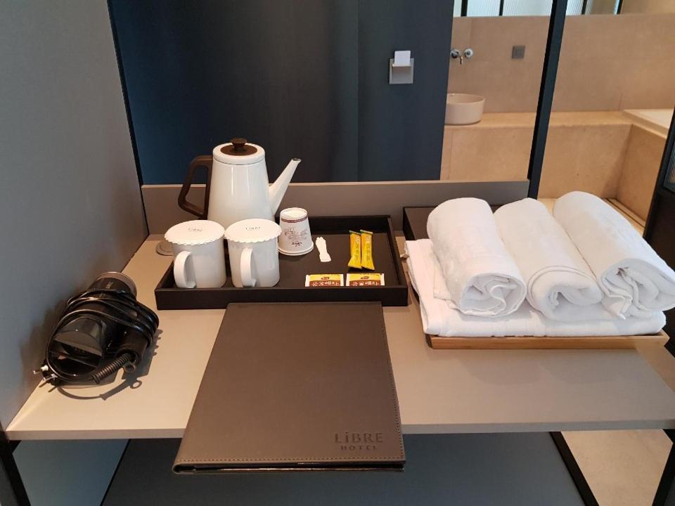 Postel nebo postele na pokoji v ubytování Hotel Libre