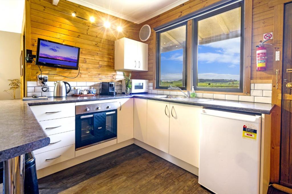 Kuchyň nebo kuchyňský kout v ubytování Mole Creek Cabins