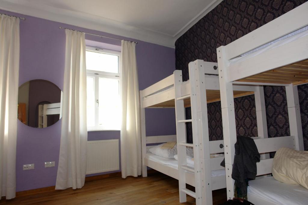 Postel nebo postele na pokoji v ubytování Lotte - The Backpackers