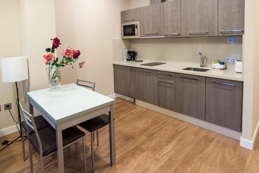 Kuchyňa alebo kuchynka v ubytovaní SEVITUR Seville Comfort Apartments