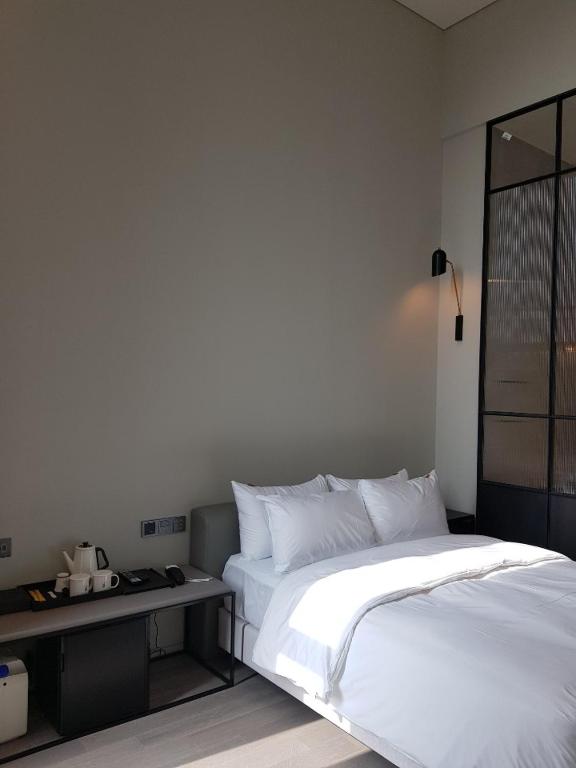 Postel nebo postele na pokoji v ubytování Hotel Libre