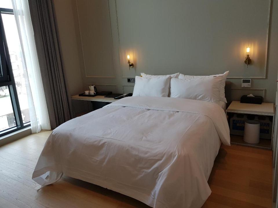 Postel nebo postele na pokoji v ubytování Hotel Libre