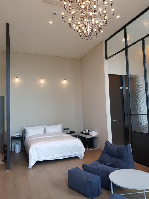 Postel nebo postele na pokoji v ubytování Hotel Libre
