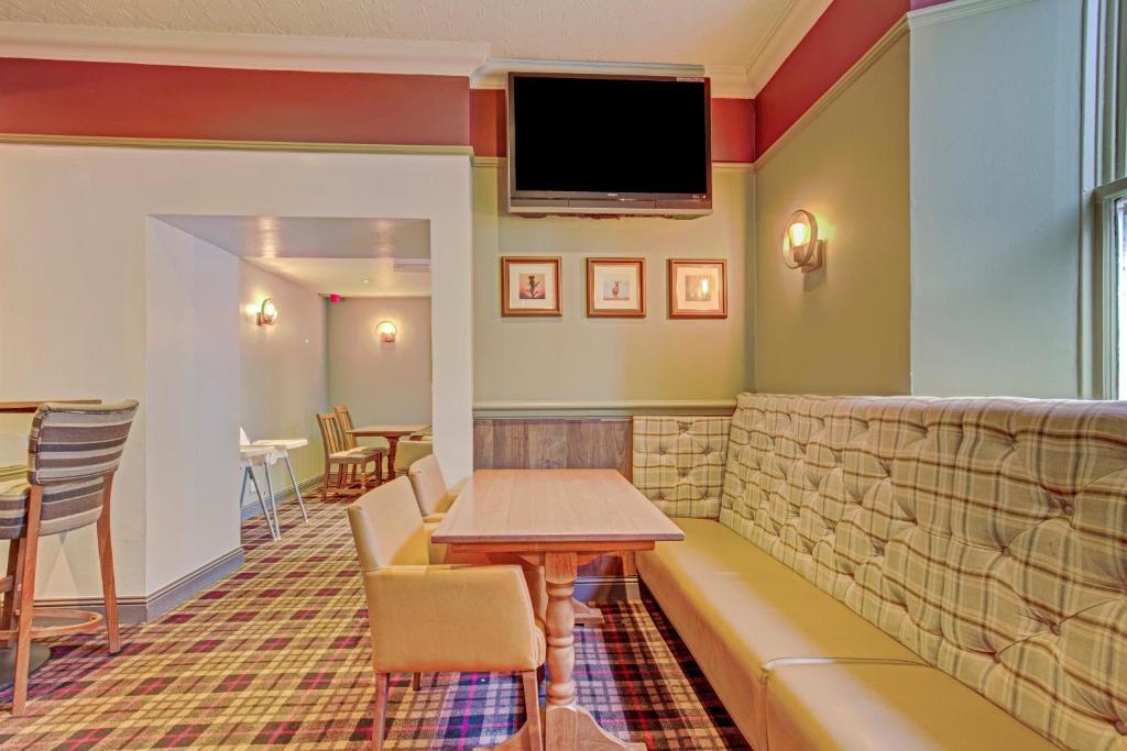 Posezení v ubytování Kinloch Arms Hotel