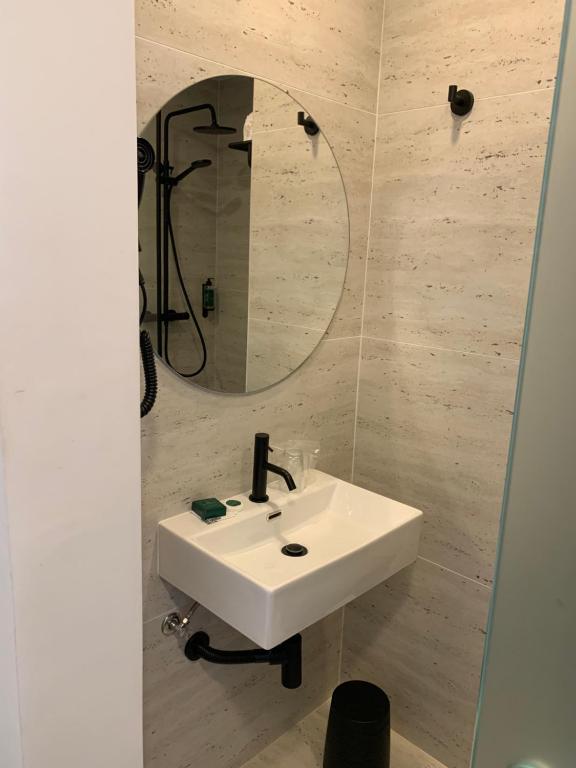 Koupelna v ubytování Hotel Moutados