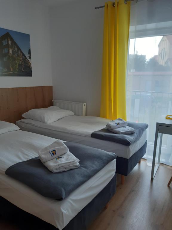 Posteľ alebo postele v izbe v ubytovaní SZWEDZKA22 PL Premium Rooms