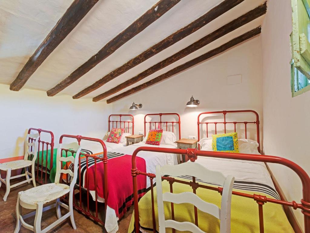 Postel nebo postele na pokoji v ubytování Lively holiday home in Fraga with private pool