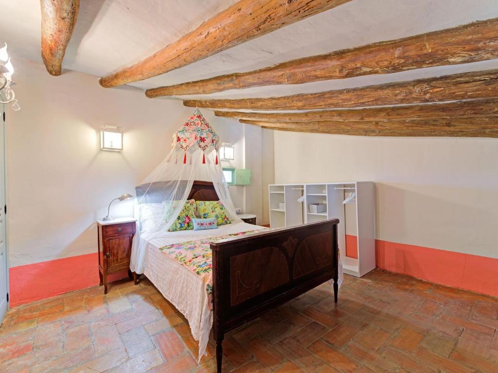 Postel nebo postele na pokoji v ubytování Lively holiday home in Fraga with private pool