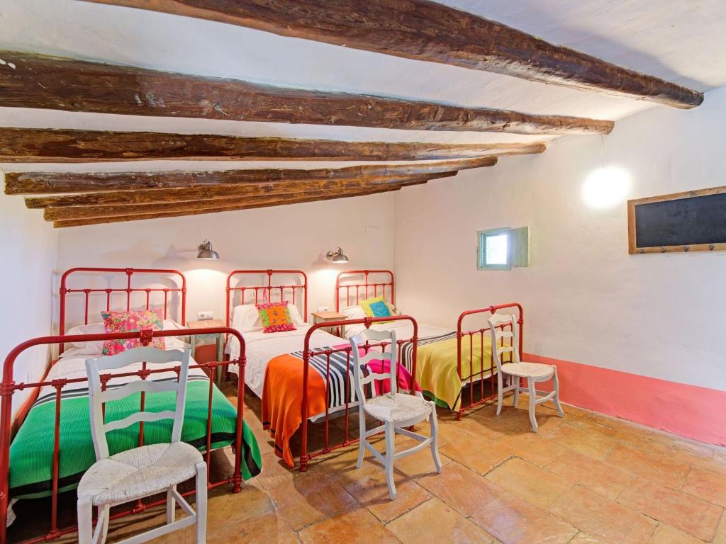 Postel nebo postele na pokoji v ubytování Lively holiday home in Fraga with private pool