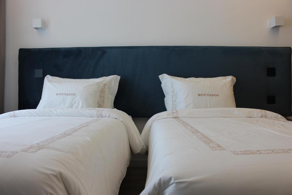 Postel nebo postele na pokoji v ubytování Hotel Moutados